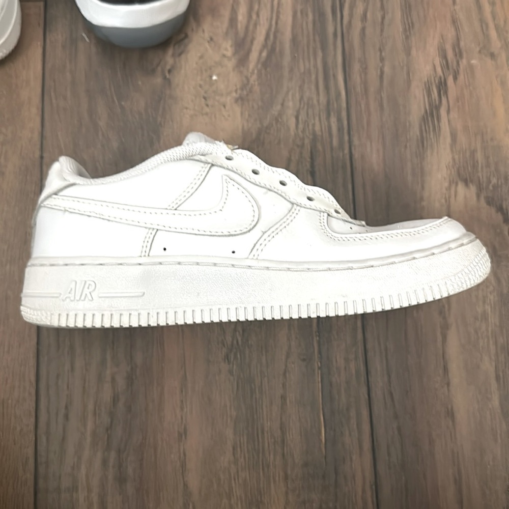 All white Nike lows size 4